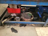 an image of a workbench with a lot of tools on it