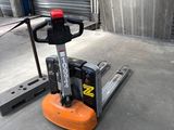 a fork lifter that is sitting on the ground