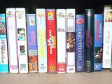 a lot of dvds in a box on the shelf