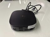 an image of a small black device on a white table