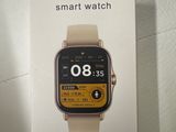 a box with a smart watch on it sitting on a table
