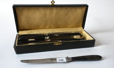 a knife and a knife holder in a box