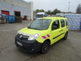 une camionnette jaune garée dans un parking