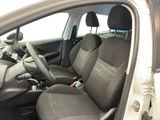 the interior of a car with two seats and a steering wheel
