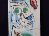 une image représentant un tableau d'un homme aux yeux verts sur fond noir