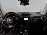 a dashboard of a small car with a steering wheel