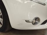 a close up of a car ' s front bumper
