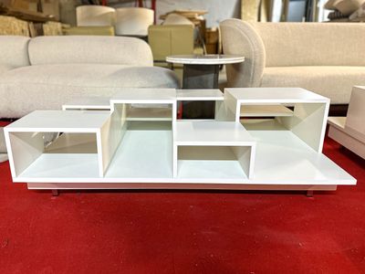 a model of a living room with couches and a coffee table