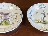 two plates that are sitting on a table