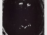 an image of a black and white drawing of a man ' s face