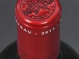 a close up of a bottle of wine on a table