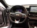 the interior of a car with a steering wheel, dashboard, and dash board
