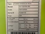 a close up of a label on the back of a machine
