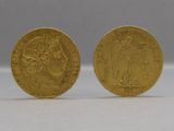 two gold sovereigns, one of which is a sovereign and the other of which is a sovereign