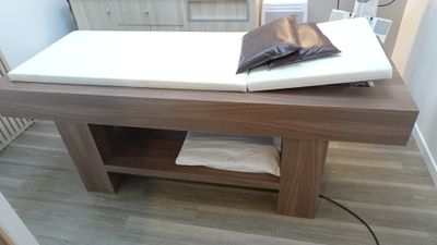 a table that has a pillow on top of it