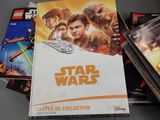 a lot of star wars books on the table