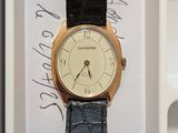 a watch that is sitting in a box with writing on it