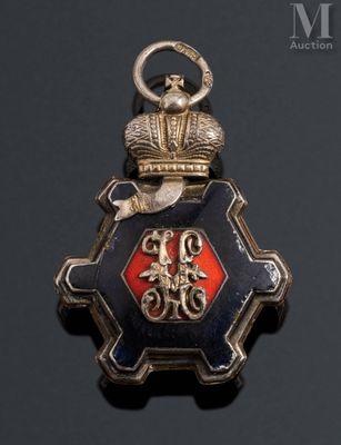 an image of a badge with a crown on it