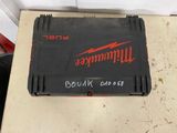 a close up of a box on a table with a red and black logo