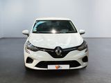 the front view of a white car in a showroom