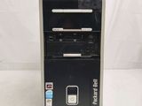 a black and silver desktop computer on a white surface