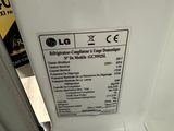 a label on the back of a white refrigerator