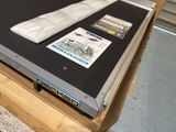 a box that has a piece of paper on top of it
