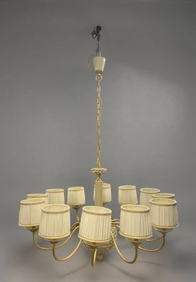 a large chandelier with eight lamps hanging from the ceiling