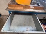 a drawer that has some tools inside of it