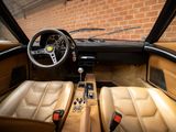 the interior of a car with leather seats and a steering wheel