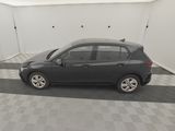 a picture of a black car parked in a garage