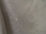 a close up view of a toilet with a toilet paper roll on it