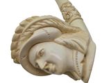 a statue of a woman with a pipe in her hand