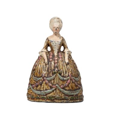 an image of a figurine of a woman in a dress