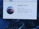 a computer screen with a picture of a mountain in the background