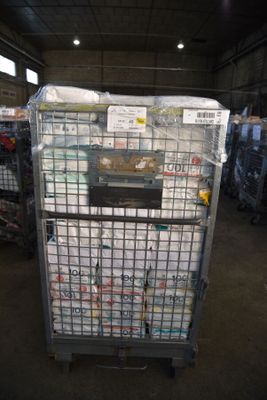 a large metal cart with a lot of items in it