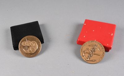 two coins sitting next to each other on a table