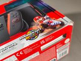 packaging of a nintendo wii game console with mario kart and mario kart