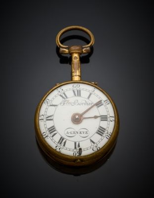 une montre de poche en or avec des chiffres romains