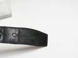 a black leather belt with a silver buckle on it