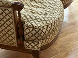 an image of a chair and ottoman in a living room