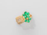 an emerald and diamond ring