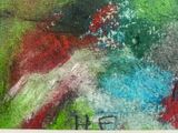 a picture of a painting of a hummingbird on the wall