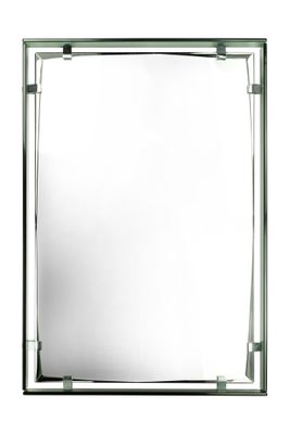Le miroir est en verre et possède un cadre en métal.