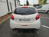 a white car parked on the side of the road