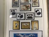 an open book with a picture of birds on it