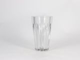 a clear glass that is sitting on a table