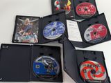 four dvds in a case on a white table