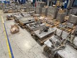 a large warehouse filled with lots of machines and pallets