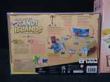 a box of candy island toys on the table